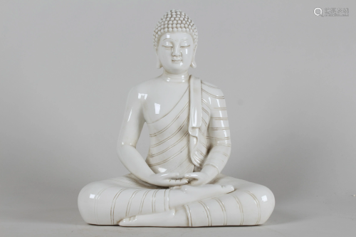 A Chinese White-coding Buddha Fortune Statue