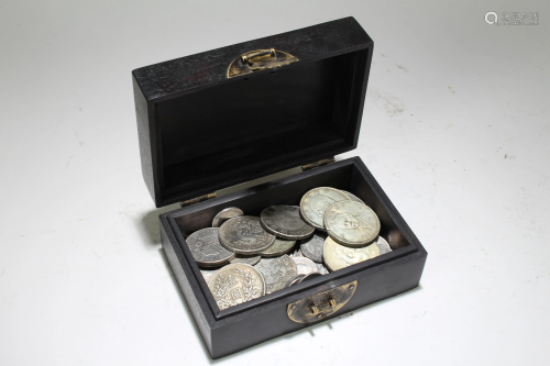 A Chinese Coin-filled Black Lidded Wooden Box