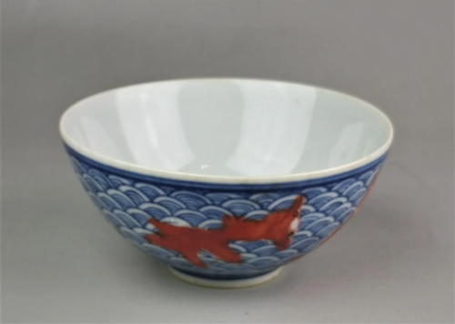 A small Chinese blue and white with red fish