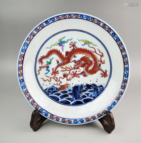 A Chinese Qing style blue and white and doucai dragon