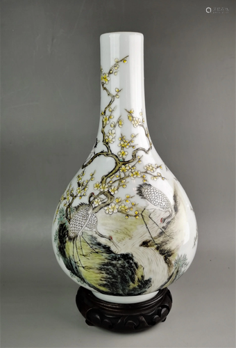 A Chinese Qing style famille rose porcelain vase