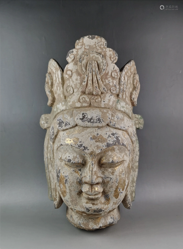 A Chinese antique carved stone gilt head of B uddha