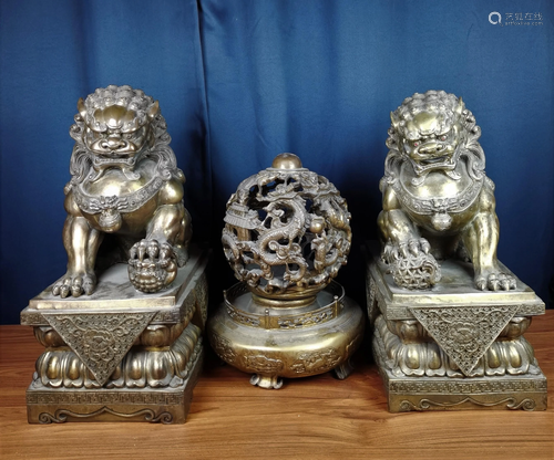 Three large Chinese Qing period bronze lions and dragon