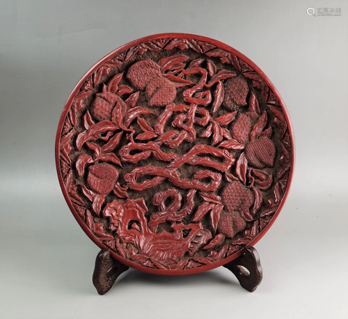 A large Chinese Qing style lacquerware plate