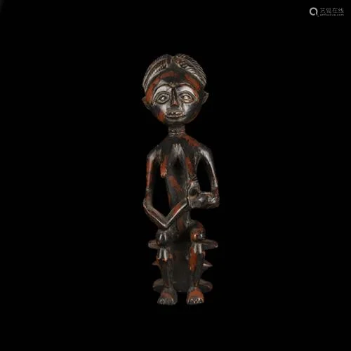 African Wooden Seated Figure of Tribe Man