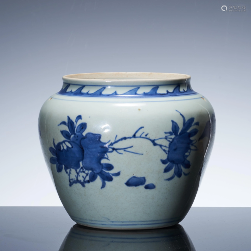 Small pot with blue and white flower pattern in early