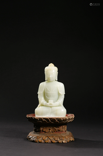 Ming Dynasty: white jade statue of Sakyamuni Buddha