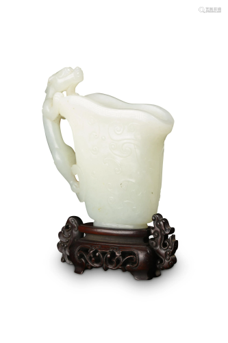 A white jade libation cup, carved with a chilong W 8,5