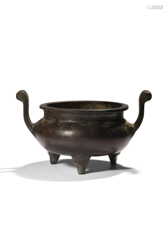A tripod bronze censer, with two upright arched