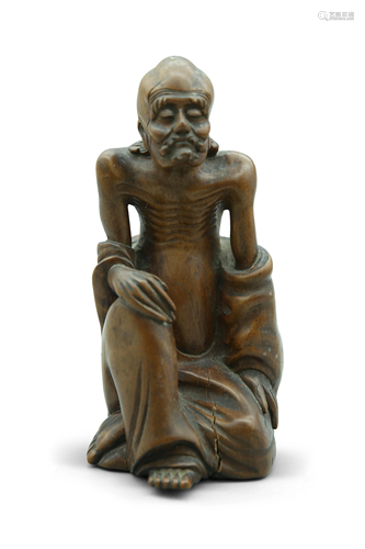 A wooden figure of Luohan, H 16 cm