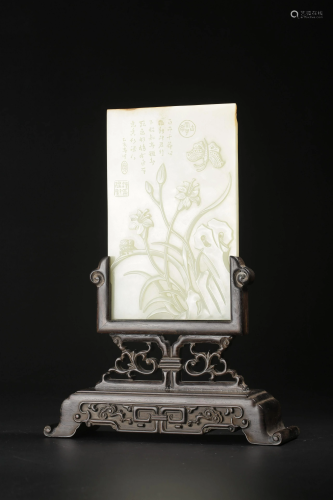 A white jade carved plaque, fitted in wooden stand, W