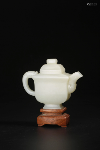 A carved white jade teapot, W 12 cm - H 13 cm -