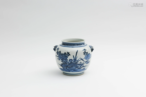 A blue and white jar, decorated with peonies and