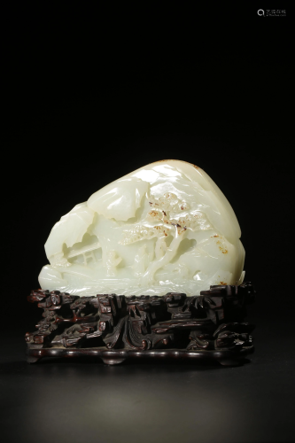 A white jade carving of a mountain, W 14 cm - H 9.5 cm