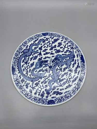 A Chinese blue and white round plaque