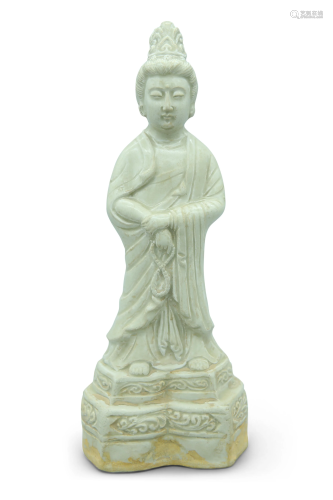 A white glazed ding ware type figure, H 26 cm