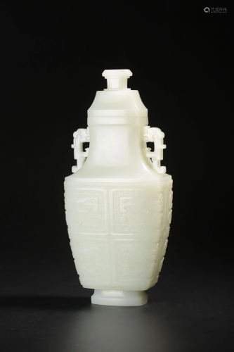 A finely carved white jade vase, W 9 cm -