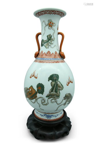 A famille verte and underglaze blue bottle vase, paired