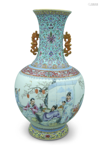 A famille rose vase, decorated with figures carrying