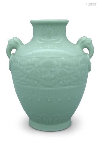 A celadon-glazed begonia shaped vase, H 23 cm