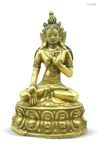 A gilt bronze figure of Tara, H 16 cm