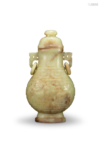 A yellow and russet jade vase, with archaistic carving,