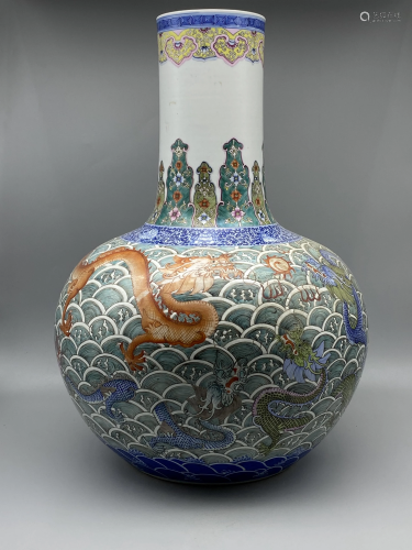 A famille rose 'dragon' bottle vase, H 53 cm