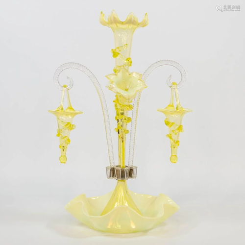 A yellow and clear glass table centrepiece pic-fleur,