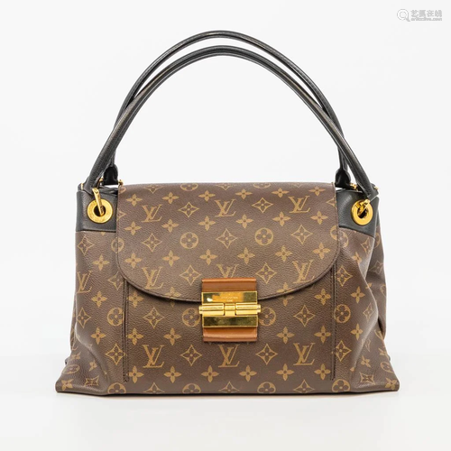 An authentic Louis Vuitton handbag with gold-plated