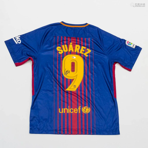 A soccer jersey of FC Barcelona with No 9 and signed by