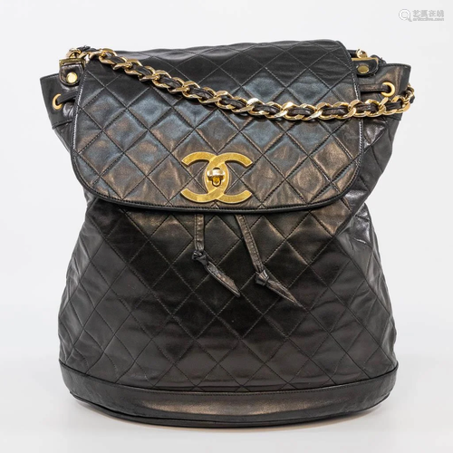 A vintage Chanel handbag with gold-plated elements and