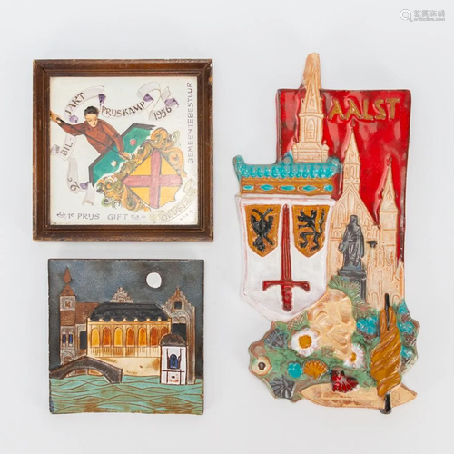 A collection of 3 ceramic wall decorations made by