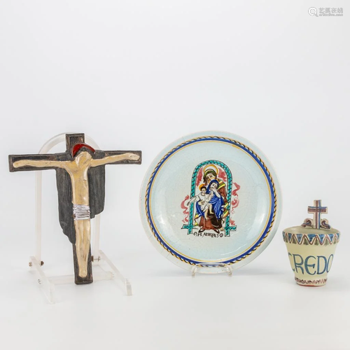 A display plate, crucifix and holy water font, made by