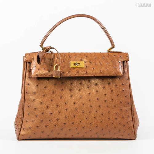 A handbag made of ostrich leather, with gold-plated