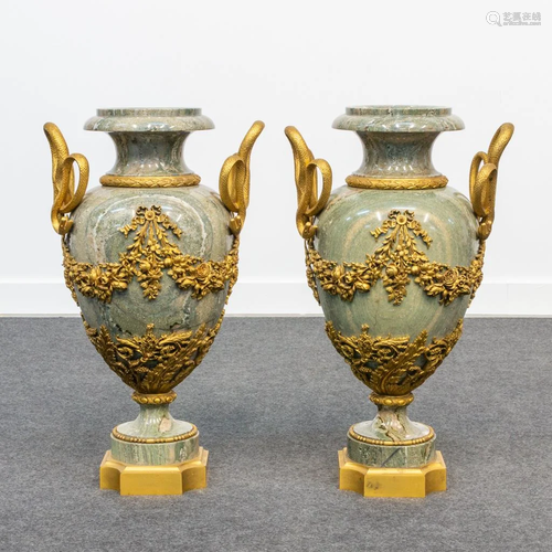 A pair with ormolu bronze mounted marble vases