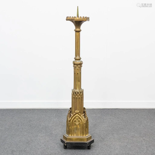 A large Church candlestick in neogothic style, made of