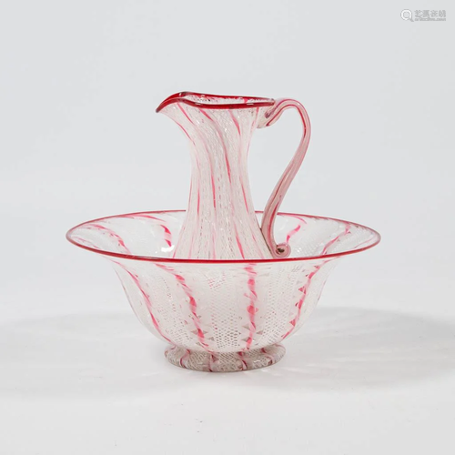 A washing bowl and pitcher, made of glass in Murano,