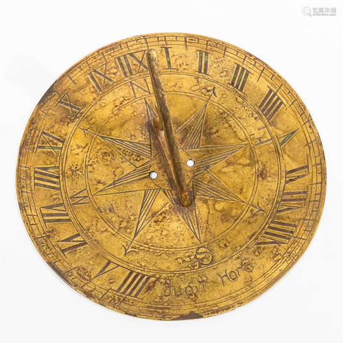 An antique sundial, 'Fugit Hora', made during the 19th