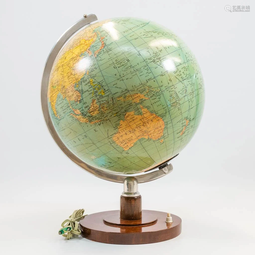 A glass globe on wood base, marked SVH Staatskunde