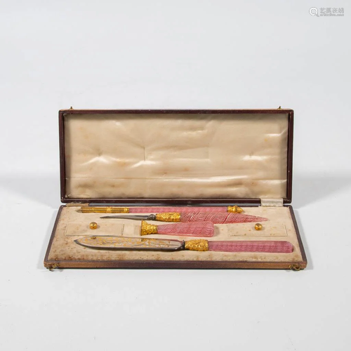 A collection of writing instruments in a case with