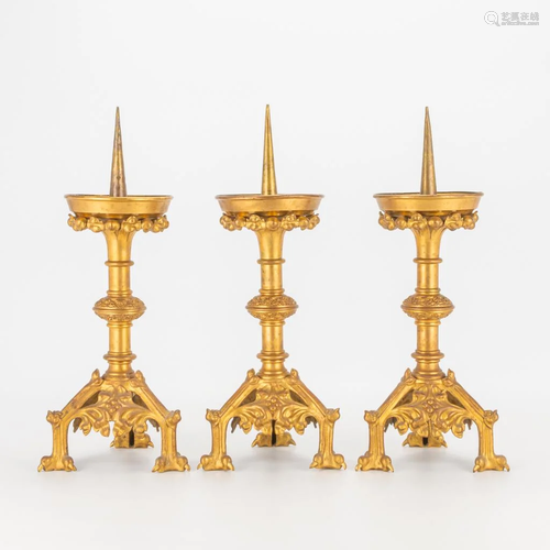 A collection of 3 bronze candelsticks in neogothic