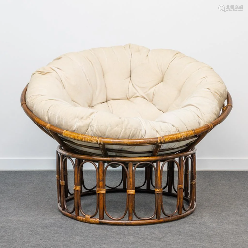 A mid-century round Rotan lounge chair, with large