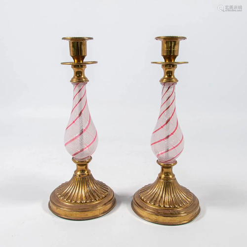 A pair of candlesticks, bronze mounted glass, made in