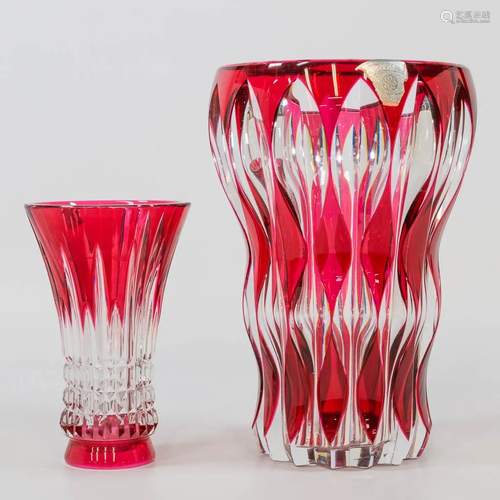 A collection of 2 vases made of cut crystal and marked