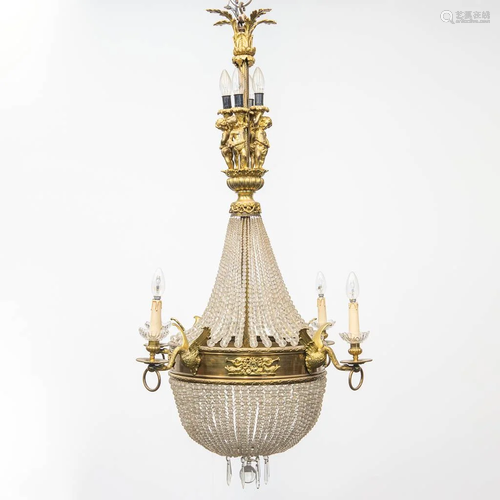 A bronze 'Sac-�-Perles' chandelier in empire style with