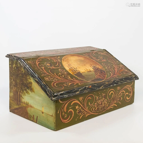 An antique writing box with a hand-painted decor with a