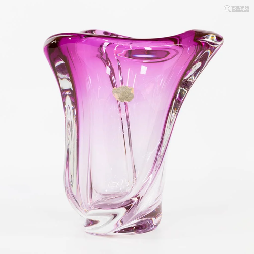 A large vase made of colored crystal. Marked Val Saint