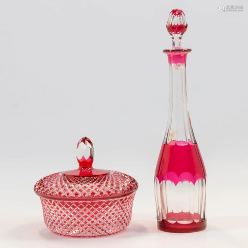 A carafe and candy jar made of cut crystal and Val