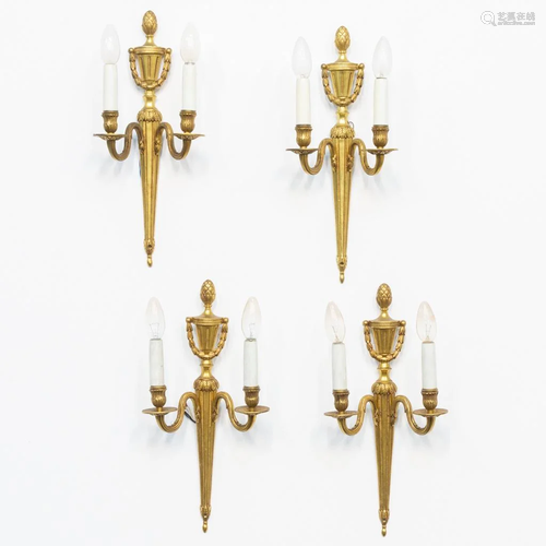 A collection of 4 bronze wall lamps in classical style.