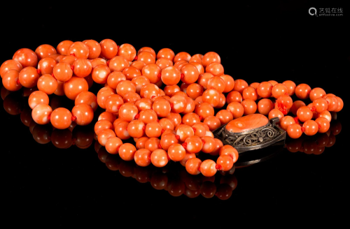 An Antique Silver and Coral Triple Strand Necklace